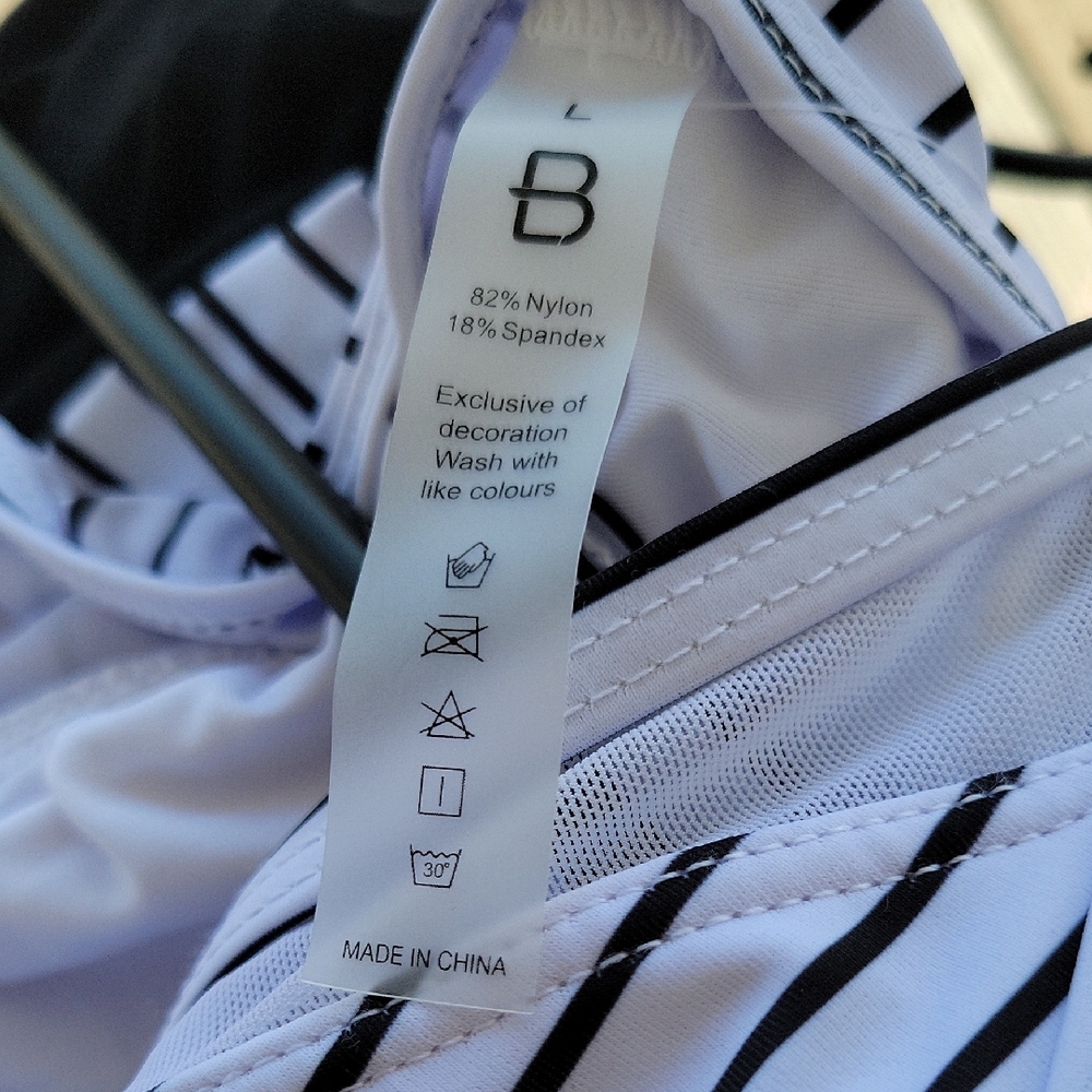 Striped Black and White One Piece Swimsuit With Shirred Sides Over Skirt - Picture 8 of 9